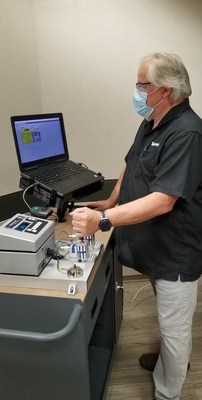 Robin Reynolds, Senior Calibration Technician at Tektronix, managing the torque screwdriver tools involved in ventilator production.