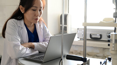 Dr. Battsetseg, in Ulaanbaatar, Mongolia, virtually consults with Orbis Volunteer Faculty member Dr. Ron Pelton, in Colorado, USA, to discuss a patient with a complicated ophthalmic case.  Photo: Geoff Oliver Bugbee