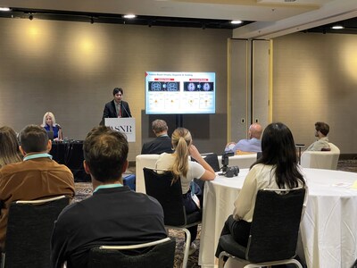 Jake Junkil Been, Co-CEO of Neurophet, delivering a presentation at ASNR 2025.