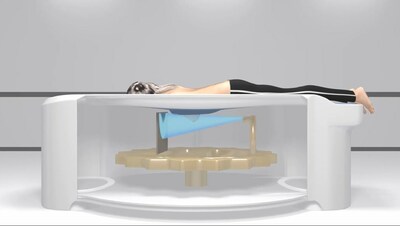 Woman on Koning Vera Breast CT (PRNewsfoto/KONING CORPORATION) Woman on Koning Vera Breast CT (PRNewsfoto/KONING CORPORATION)