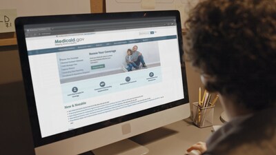 Man looking on Medicaid website.