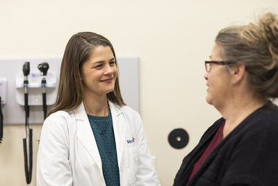 Dr. Molly Ehlman, left, a Mercy geriatrician, said DAX “makes it possible to focus on the person in front of me instead of the computer screen. I can look patients in the eyes and really hear what they’re saying without worrying about typing notes during their visit. It allows me to spend less time in front of a computer and more time on the aspects of patient care that matter most." Dr. Molly Ehlman, left, a Mercy geriatrician, said DAX “makes it possible to focus on the person in front of me instead of the computer screen. I can look patients in the eyes and really hear what they’re saying without worrying about typing notes during their visit. It allows me to spend less time in front of a computer and more time on the aspects of patient care that matter most."
