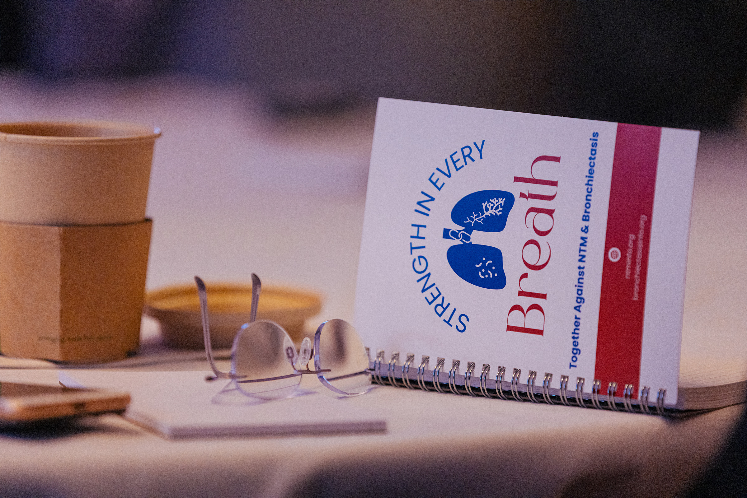 Pulmonary nontuberculous mycobacteria (NTM) and bronchiectasis are linked together. NTM lung infection can cause or worsen significant respiratory damage, such as bronchiectasis. Pulmonary nontuberculous mycobacteria (NTM) and bronchiectasis are linked together. NTM lung infection can cause or worsen significant respiratory damage, such as bronchiectasis.