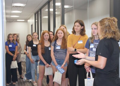 Young women and girls connecting with various healthcare professionals at Careers in Medicine.