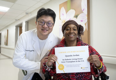 Seung Duk Lee, M.D., Ph.D., with his patient, Quanda Jordan, during her recovery at VCU Health. (Kevin Morley, VCU Enterprise Marketing and Communications)