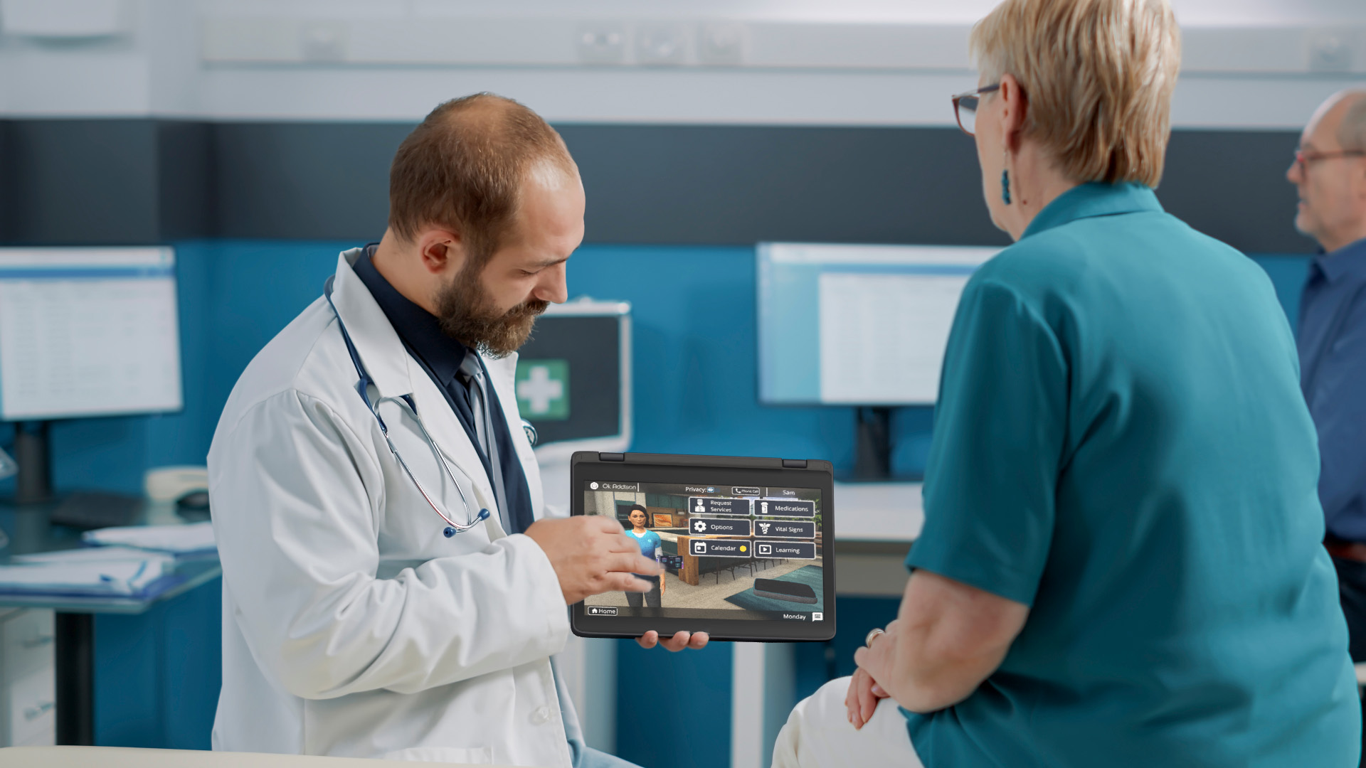 Senior talking to doctor with Addison Care tablet
