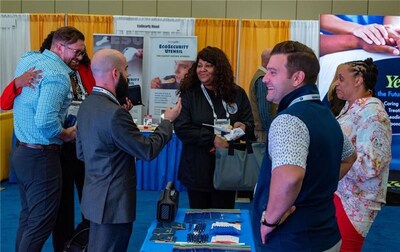 Fusion Senior Sales Executive Ryan Van Buren (leftmost) and Fusion Chief Growth Officer Michael Jakovcic (second from right) at the NCCHC 2025 Winter Conference.