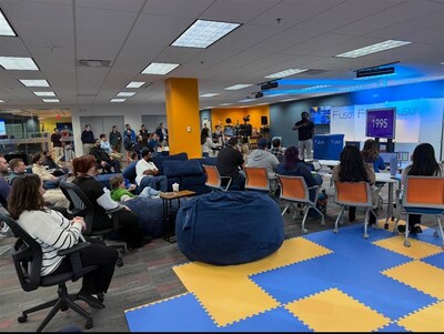 Fusionites gathered to watch keynote speaker Marcus Bullock at the company's 2025 Reactor team-building event.