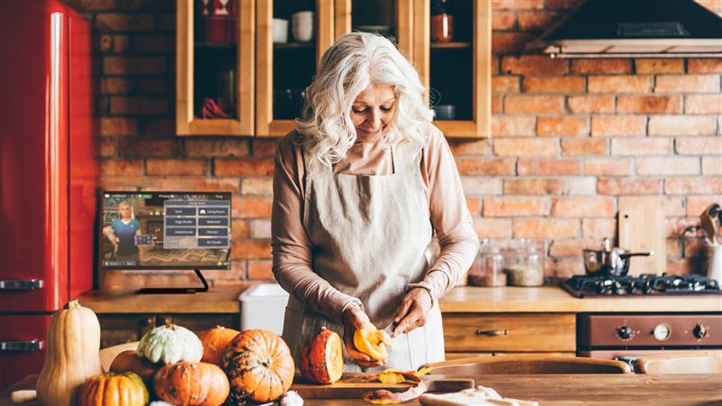 Senior Woman in Kitchen with Addison Care Console