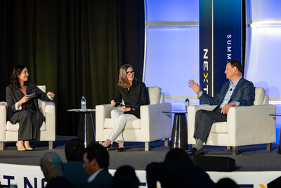 Cathie Wood, Chief Executive Officer and Chief Investment Officer of Arc Invest, talks with John Couris, President and CEO of Florida Health Sciences Center, and Rachel Feinman during the NEXT Summit on Feb. 11, 2026, at the JW Marriott on Water Street in Tampa.