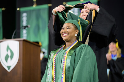 A proud moment of achievement&mdash;a Rasmussen University master&rsquo;s graduate is hooded during the 2025 Illinois Commencement ceremony, marking the culmination of their hard work, dedication, and academic journey.