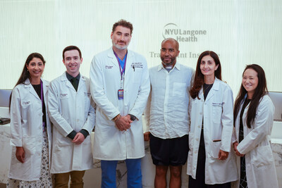 Bertrand Nelson, HIV-positive lung and liver recipient (third from right), with members of his NYU Langone Transplant Institute care team. From left, Raiya Sarwar, MD, transplant hepatologist; Mark A. Sonnick, MD, transplant pulmonologist; Karim J. Halazun, MD, surgical director of liver transplantation; Sapna Mehta, MD, clinical director of the Transplant Institute; and Stephanie H. Chang, MD, surgical director of lung transplantation. Bertrand Nelson, HIV-positive lung and liver recipient (third from right), with members of his NYU Langone Transplant Institute care team. From left, Raiya Sarwar, MD, transplant hepatologist; Mark A. Sonnick, MD, transplant pulmonologist; Karim J. Halazun, MD, surgical director of liver transplantation; Sapna Mehta, MD, clinical director of the Transplant Institute; and Stephanie H. Chang, MD, surgical director of lung transplantation.